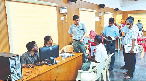 Kumar Jayant conducting an inquiry with Kalimedu residents on Tuesday