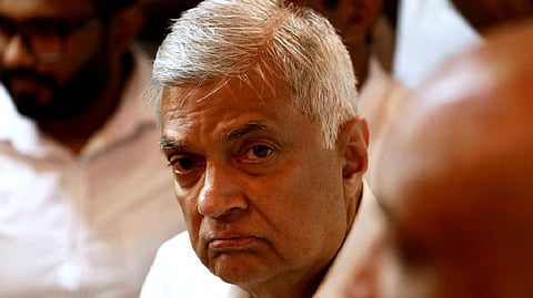 Ranil Wickremesinghe, newly appointed prime minister, arrives at a Buddhist temple after his swearing-in ceremony amid the country's economic crisis, in Colombo, Sri Lanka, May 12, 2022.