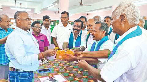 Farmers celebrating opening of Mettur Dam in Thanjavur on Tuesday