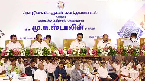 (top) Stalin at the dais with ministers; (bottom) the entrepreneurs.