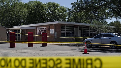 Crime scene tape surrounds Robb Elementary School in Uvalde, Texas