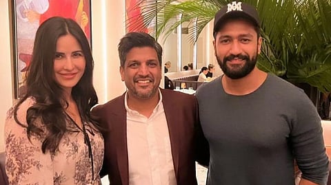 Katrina Kaif, Vicky Kaushal and with a member from the restaurant