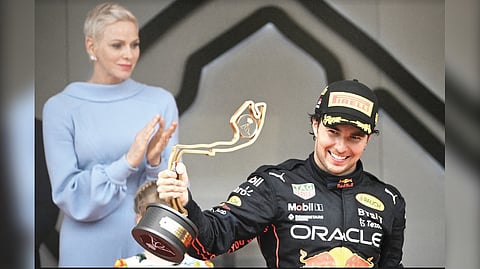 Sergio Perez with the Monaco GP trophy.