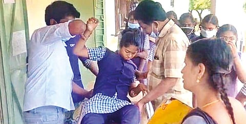 Rithanya being taken to the exam centre in Tirupur
