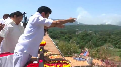 After opening the dam, CM MK Stalin showered flowers on the gushing waters.