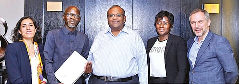 Arun Alagappan flanked by the Baobab Mining and Chemicals Corporation team after signing the agreement