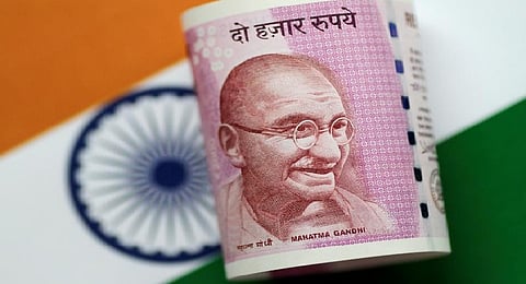 An India Rupee note is seen in this illustration photo