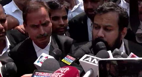 Advocate Vishnu Jain speaking to reporters