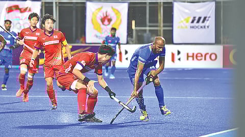 Action during India-Japan match in Asia Cup hockey