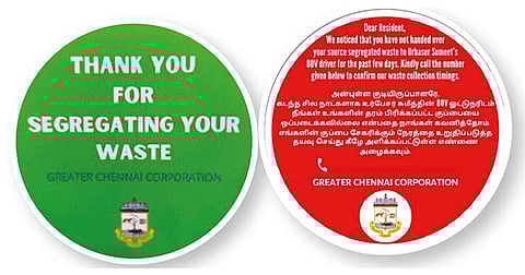 Green and red stickers that GCC plans to paste on households