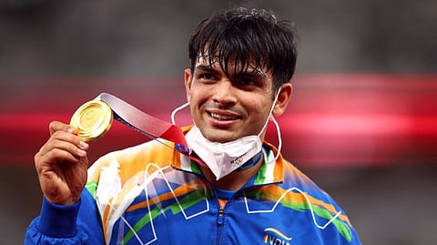 Tokyo 2020 Olympics - Athletics - Men's Javelin Throw - Medal Ceremony - Olympic Stadium, Tokyo, Japan - August 7, 2021. Gold medallist Neeraj Chopra of India reacts on the podium