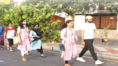 Actor & MMA Athlete Santhtosh Prathap (right) led the walkathon at Elliot?s Beach on Sunday