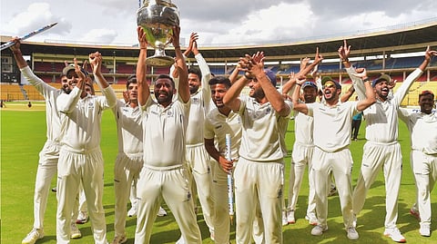 Madhya Pradesh players celebrate the  Ranji Trophy triumph