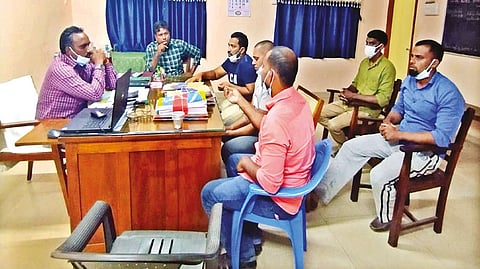 The five fishermen interacting with fisheries department officials in Kanniyakumari on Thursday