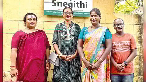 Malaika (second from left) with members of Snegithi