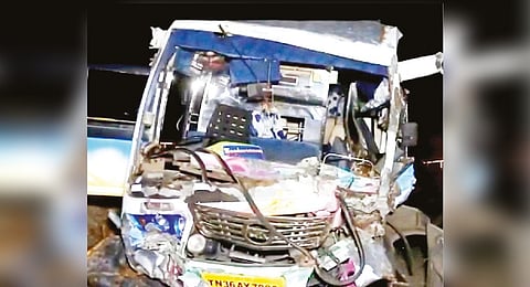 The mangled remains of the tourist vehicle in Namakkal