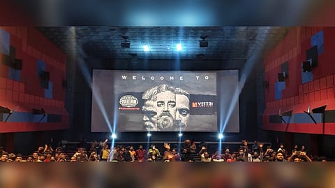 Fans celebrate the release of Vikram in a theatre in Chennai