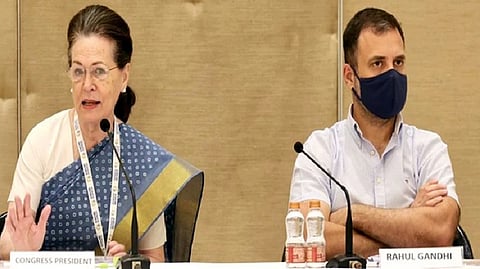 Congress Interim President Sonia Gandhi with party leader Rahul Gandhi