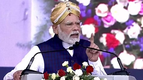 Modi addressing a massive rally in Bengaluru after several inaugurations, foundation laying and dedication programmes
