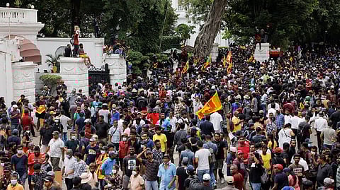Demonstrators protest inside the Presidential Secretariat premises
