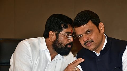 Maharashtra Chief Minister (CM) Eknath Shinde interacts with state Deputy CM Devendra Fadnavis