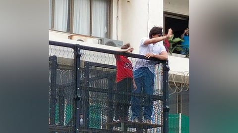 Shah Rukh Khan, AbRam wave at fans