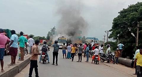 Smoke emanated from a private bus plying along the Highway near Sriperumbudur