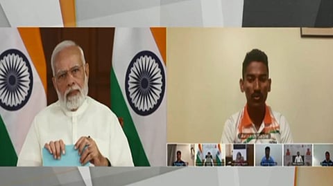 Avinash Sable interacting with PM Modi