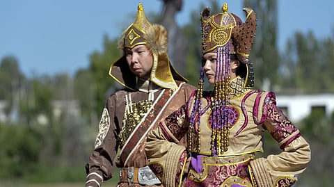 Members of the Russian Folk Dance Ensemble of Adygea perform during the World Nomads Fashion festival Issyk-Kul 2022, at Cholpon-Ata.