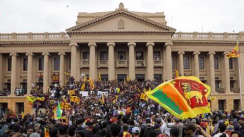 Demonstrators protest inside the Presidential Secretariat premises, after President Gotabaya Rajapaksa fled
