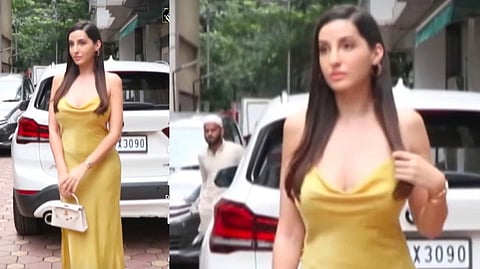 Nora Fatehi sizzles in yellow slit dress with mini bag in Mumbai