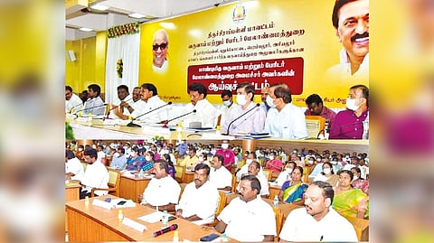 Revenue Minister KKSSR Ramachandran conducting a review meeting in Tiruchy on Thursday