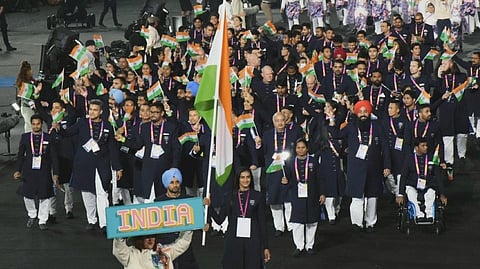 Flagbearers PV Sindhu and Manpreet Singh lead TeamIndia out in the Parade of Nations at the Birmingham 2022 Opening Ceremony