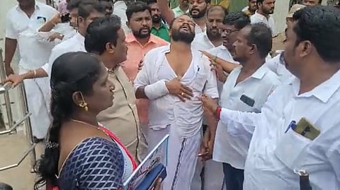 Screengrab of an AIADMK worker attacked in scuffle.