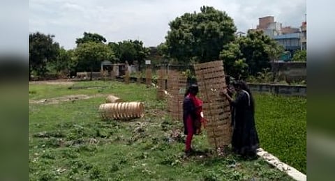 The volunteers replaced protective mesh with bamboo fencing