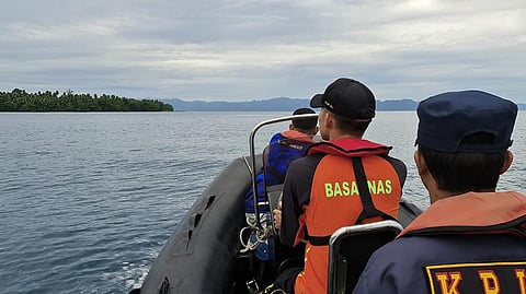 Rescuers in search of survivors after a passenger boat sank in the waters