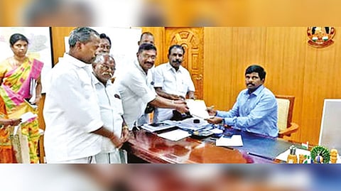AIADMK functionaries submitting a petition to the District Collector, M Pradeep Kumar, in Tiruchy.