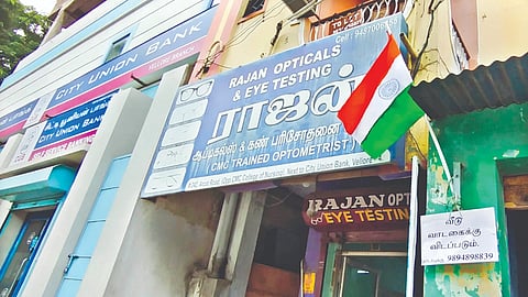 A flag hoisted atop a shop not lowered in Vellore till Friday.