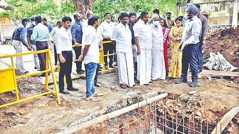 Municipal Administration Minister KN Nehru inspecting the storm water drain at Royapuram zone on Tuesday