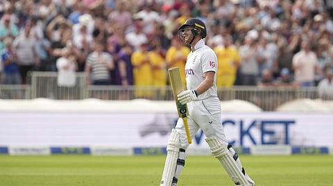 England's captain Ben Stokes walks back to the players pavilion after being dismissed by South Africa's Kagiso Rabada for 103 runs during the second day of the 2nd test cricket match.