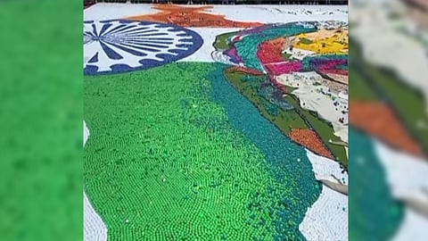 Visual of the indian map and PM Modi created by artists using caps of bottles