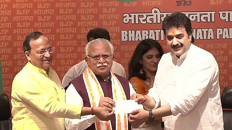 Kuldeep Bishnoi with Haryana CM Manohar Lal Khattar