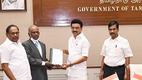 Retired Madras High Court judge A Arumugasamy presented the report of the Commission of Inquiry