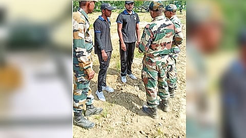 Garuda Aerospace technicians interacting with Army personnel