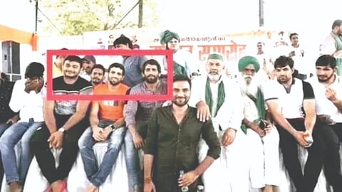 In the photo, wrestlers Bajrang Punia, Deepak Punia and Ravi Kumar Dahiya are seen sitting on a stage along with farmer leader Rakesh Tikait.