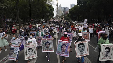 Family members, friends march seeking justice for the missing 43 students