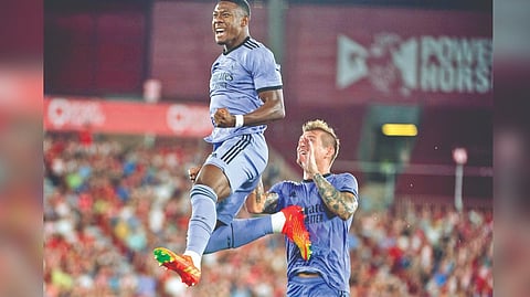 David Alaba (left) celebrates
after scoring the winning goal.