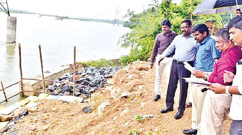 Monitoring officer for Tiruchy Dr K Manivasan inspecting flood prevention preparations at Moolathoppu in Srirangam on Wednesday