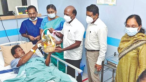 Health Minister visiting the 1,00,000th patient under Innuyir Kappom scheme at Saveetha Medical College and Hospital on Wednesday
