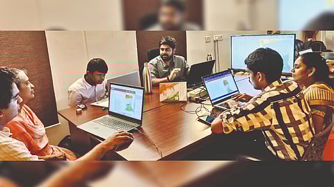 Manu Sekar with students